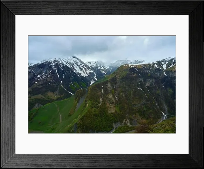 Framed Print : View of a mountain gorge with a lake Framed Print : View of a mountain gorge with a lake