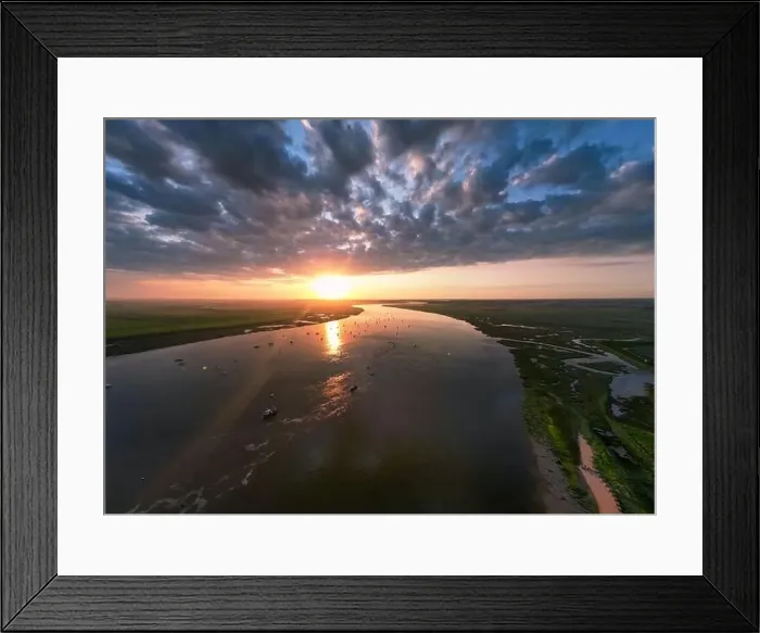 Framed Print : An aerial view of a spectacular sunset over the River Deben at Bawdsey Beach in Suffolk, UK Framed Print : An aerial view of a spectacular sunset over the River Deben at Bawdsey Beach in Suffolk, UK