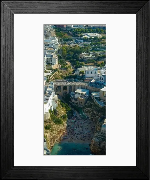 Framed Print : Polignano a Mare drone shot. Aerial view shot of Cala Paura in Puglia, Polignano. Most famous beach in South Italy Framed Print : Polignano a Mare drone shot. Aerial view shot of Cala Paura in Puglia, Polignano. Most famous beach in South Italy