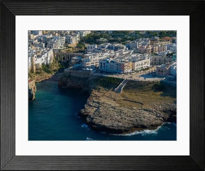 Framed Print : Polignano a Mare drone shot. Aerial view shot of Cala Paura in Puglia, Polignano. Most famous beach in South Italy Framed Print : Polignano a Mare drone shot. Aerial view shot of Cala Paura in Puglia, Polignano. Most famous beach in South Italy
