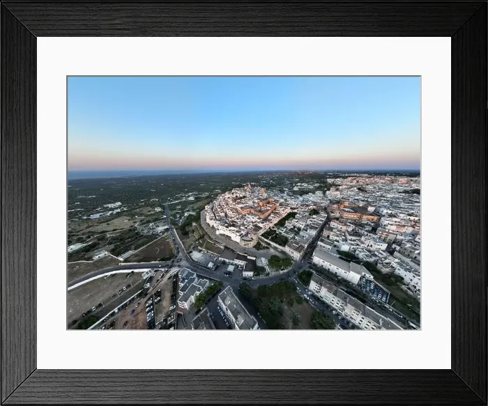 Framed Print : Aerial view of Ostuni white city in Puglia, Italy at sunset Framed Print : Aerial view of Ostuni white city in Puglia, Italy at sunset