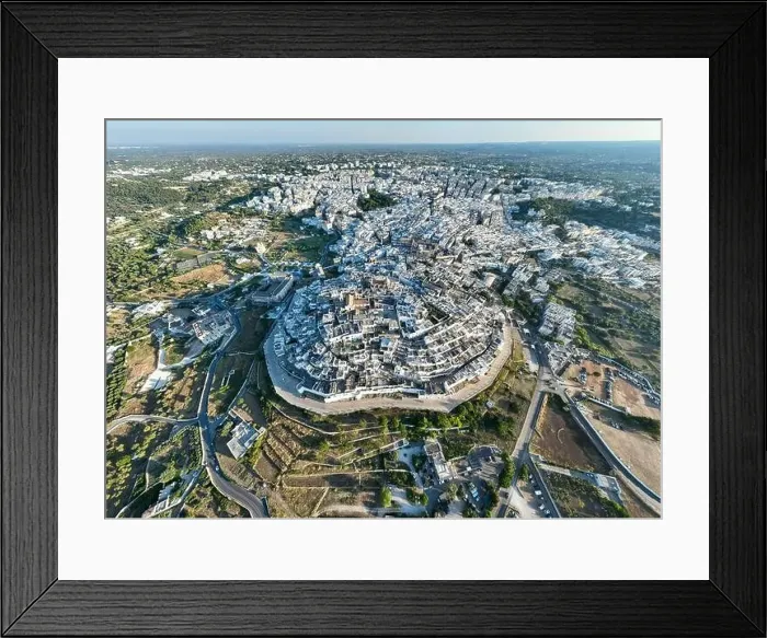 Framed Print : Aerial view of Ostuni white city in Puglia, Italy Framed Print : Aerial view of Ostuni white city in Puglia, Italy