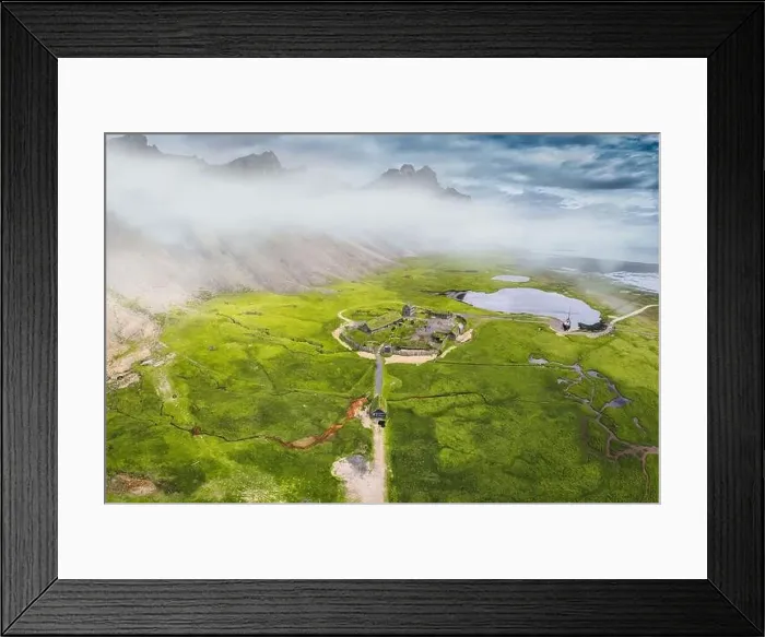 Framed Print : Aerial view of abandoned icelandic viking village on wilderness near Vestrahorn mountain during summer at Stokksnes Framed Print : Aerial view of abandoned icelandic viking village on wilderness near Vestrahorn mountain during summer at Stokksnes
