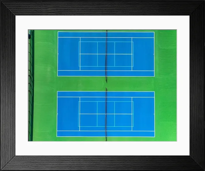 Framed Print : Aerial, drone, photo of new outdoor blue tennis court with white lines combined with light blue pickleball lines Framed Print : Aerial, drone, photo of new outdoor blue tennis court with white lines combined with light blue pickleball lines