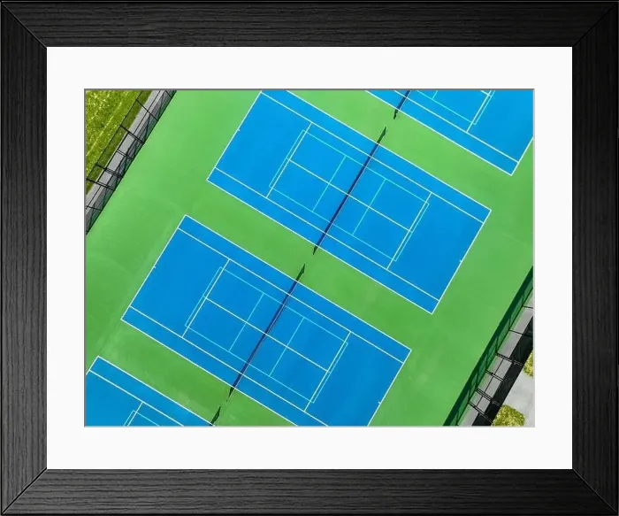 Framed Print : Aerial, drone, photo of new outdoor blue tennis court with white lines combined with light blue pickleball lines Framed Print : Aerial, drone, photo of new outdoor blue tennis court with white lines combined with light blue pickleball lines
