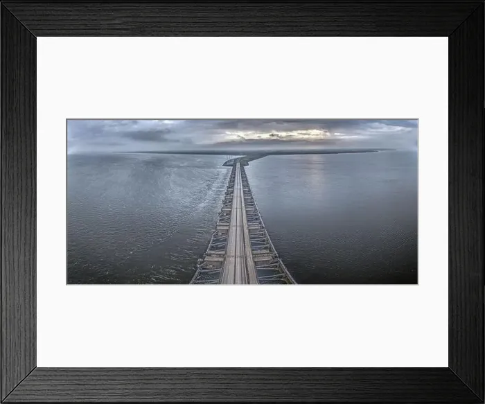 Framed Print : Drone image over the Haringvlietdam flood barrier near the Dutch town of Ouddorp against a cloudy morning sky Framed Print : Drone image over the Haringvlietdam flood barrier near the Dutch town of Ouddorp against a cloudy morning sky