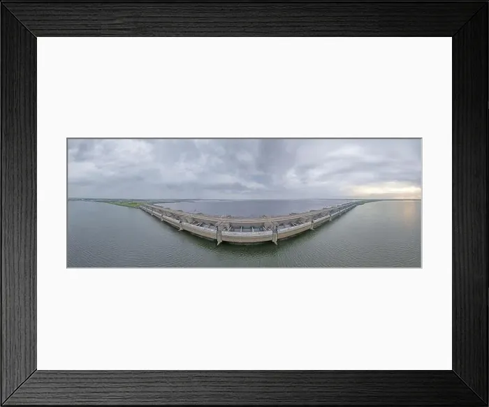 Framed Print : Drone image over the Haringvlietdam flood barrier near the Dutch town of Ouddorp against a cloudy morning sky Framed Print : Drone image over the Haringvlietdam flood barrier near the Dutch town of Ouddorp against a cloudy morning sky