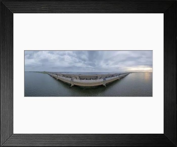 Framed Print : Drone image over the Haringvlietdam flood barrier near the Dutch town of Ouddorp against a cloudy morning sky Framed Print : Drone image over the Haringvlietdam flood barrier near the Dutch town of Ouddorp against a cloudy morning sky