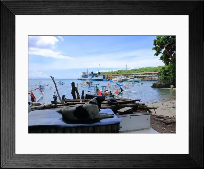 Framed Print : Padang Bai, Bali in Indonesia - February 7 2024: hustle and bustle at the harbor in east Bali Framed Print : Padang Bai, Bali in Indonesia - February 7 2024: hustle and bustle at the harbor in east Bali