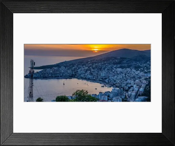 Framed Print : Panoramic image of a beautiful sunset over the city of Sarande in southern Albania Framed Print : Panoramic image of a beautiful sunset over the city of Sarande in southern Albania