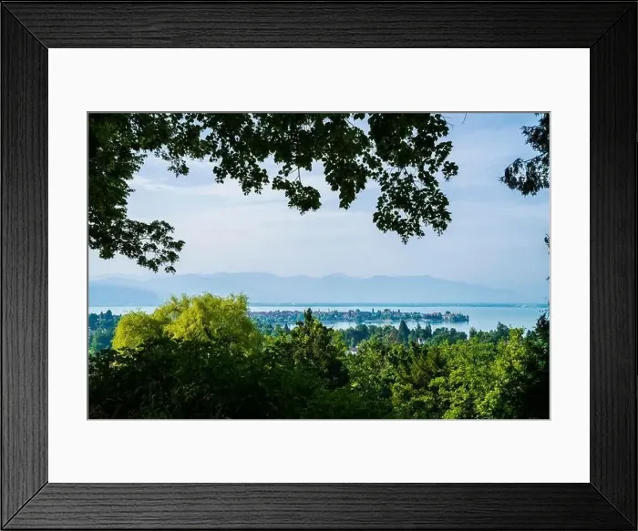 Framed Print : Germany, Lindau old town houses on island surrounded by silent bodensee lake water early morning Framed Print : Germany, Lindau old town houses on island surrounded by silent bodensee lake water early morning