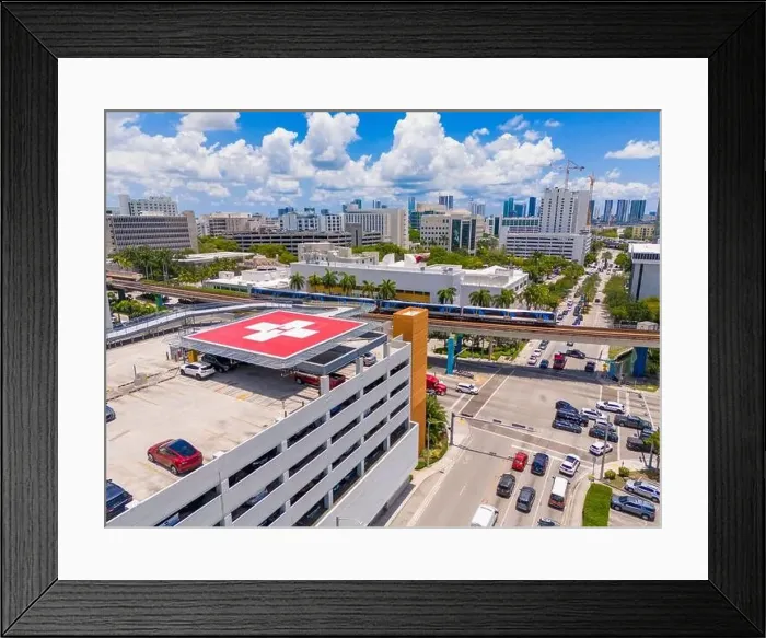 Framed Print : Helipad. Helicopter landing pad at a hospital. Aerial photo red H cross symbol. Medical center Framed Print : Helipad. Helicopter landing pad at a hospital. Aerial photo red H cross symbol. Medical center
