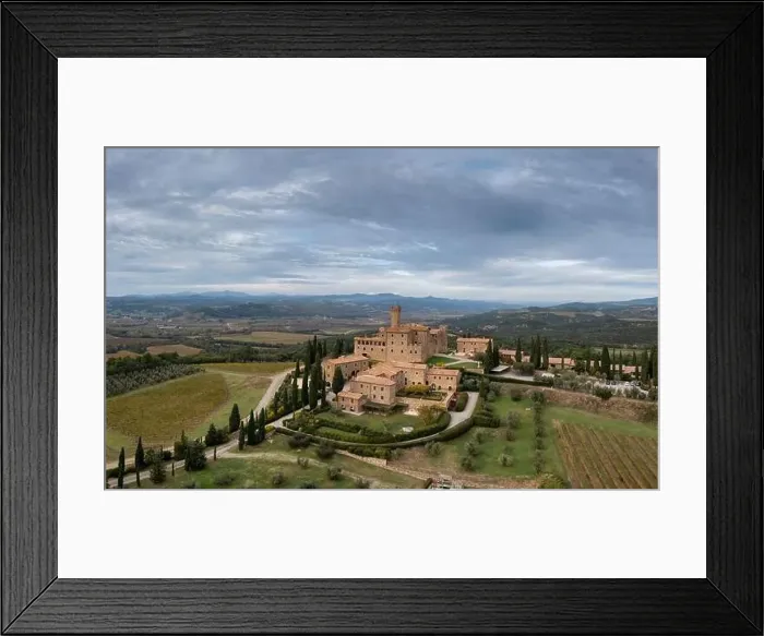 Framed Print : Aerial view of the Poggio alle Mura Castle and Villa Banfi wine resort in Tuscany Framed Print : Aerial view of the Poggio alle Mura Castle and Villa Banfi wine resort in Tuscany