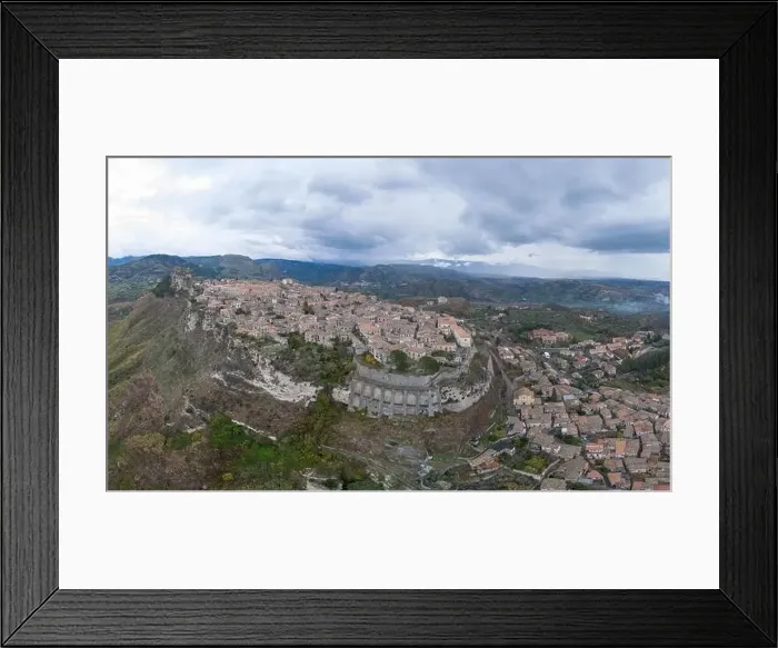 Framed Print : Drone perspective of the picturesque mountain village of Gerace in Calabria Framed Print : Drone perspective of the picturesque mountain village of Gerace in Calabria