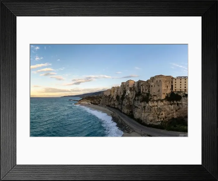Framed Print : View of Rotonda Beach and the colourful old town of Tropea in Calabria at sunset Framed Print : View of Rotonda Beach and the colourful old town of Tropea in Calabria at sunset
