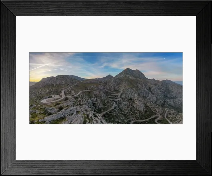 Framed Print : View of the famous snake road leading from the Coll de Reis mountain pass to Sa Calobra in the rugged landscape of Framed Print : View of the famous snake road leading from the Coll de Reis mountain pass to Sa Calobra in the rugged landscape of