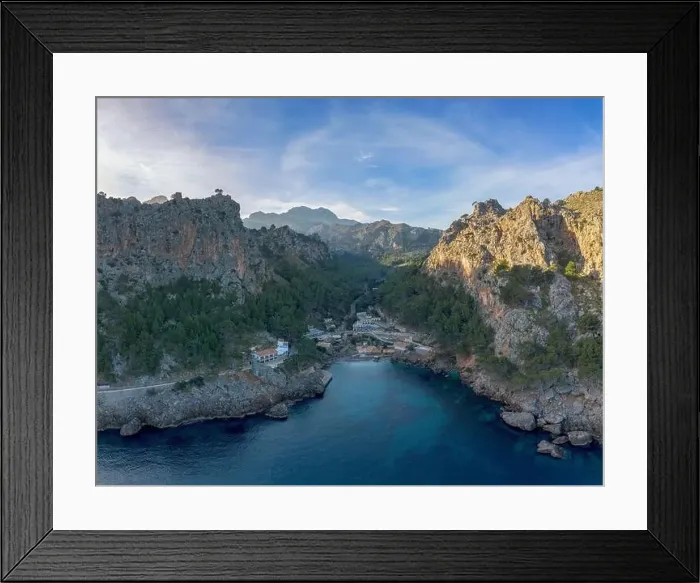 Framed Print : Drone view of the small fishing hamlet and harbour of Sa Calobra in the rugged Framed Print : Drone view of the small fishing hamlet and harbour of Sa Calobra in the rugged