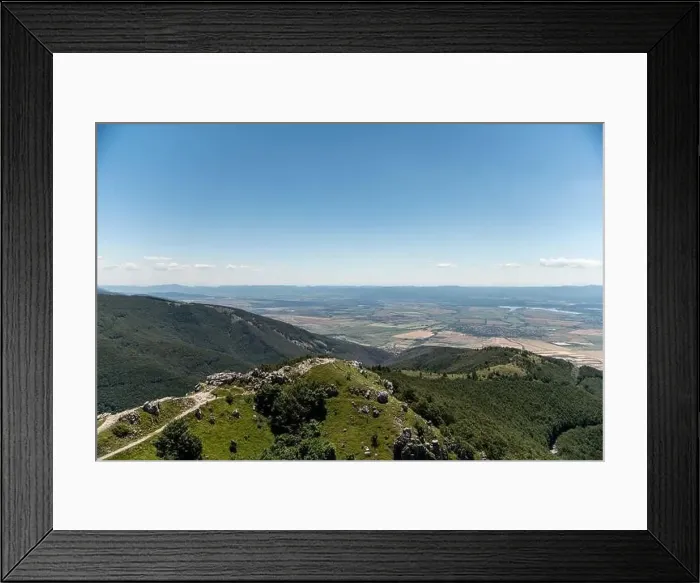 Framed Print : Beautiful landscape view from a mountain top with blue sky and some clouds