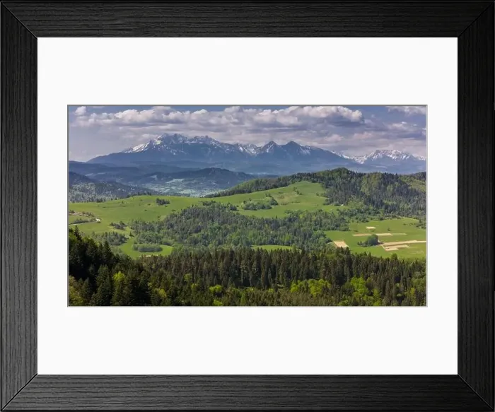 Framed Print : Aerial drone view over green hills of Pieniny National Park and snowy Tatra Mountains Framed Print : Aerial drone view over green hills of Pieniny National Park and snowy Tatra Mountains