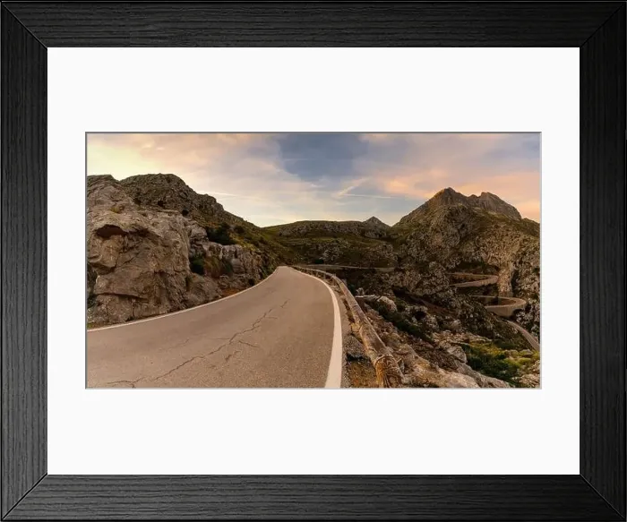 Framed Print : View of the famous snake road leading from the Coll de Reis mountain pass to Sa Calobra in the rugged landscape of Framed Print : View of the famous snake road leading from the Coll de Reis mountain pass to Sa Calobra in the rugged landscape of