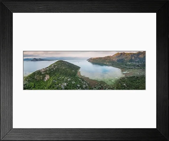 Framed Print : Aerial view of Lake Skadar surrounded by mountains and lush forests in Montenegro Framed Print : Aerial view of Lake Skadar surrounded by mountains and lush forests in Montenegro