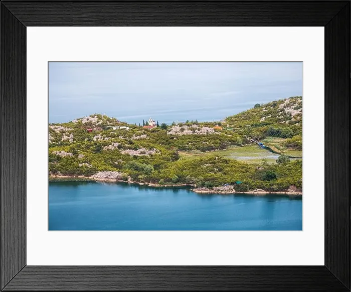 Framed Print : Aerial view of the island monastery on Lake Skadar, Montenegro, surrounded by pristine blue waters Framed Print : Aerial view of the island monastery on Lake Skadar, Montenegro, surrounded by pristine blue waters