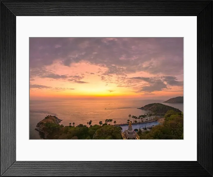 Framed Print : Aerial view of beautiful sky The sun reflects off the sea at Laem Phromthep Viewpoint at sunset Framed Print : Aerial view of beautiful sky The sun reflects off the sea at Laem Phromthep Viewpoint at sunset