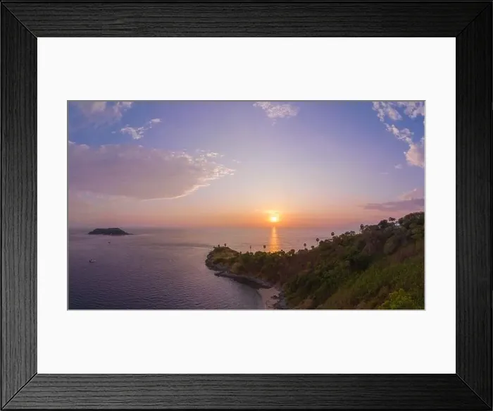 Framed Print : Aerial view of beautiful sky The sun reflects off the sea at Laem Phromthep Viewpoint at sunset Framed Print : Aerial view of beautiful sky The sun reflects off the sea at Laem Phromthep Viewpoint at sunset