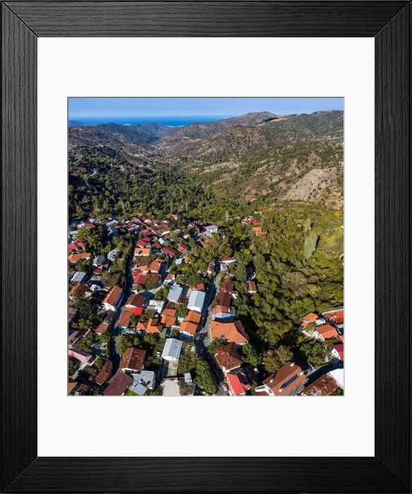 Framed Print : Village of Pedoulas in the Troodos mountains with red roofs nestled in lush green valley overlooking the sea Framed Print : Village of Pedoulas in the Troodos mountains with red roofs nestled in lush green valley overlooking the sea