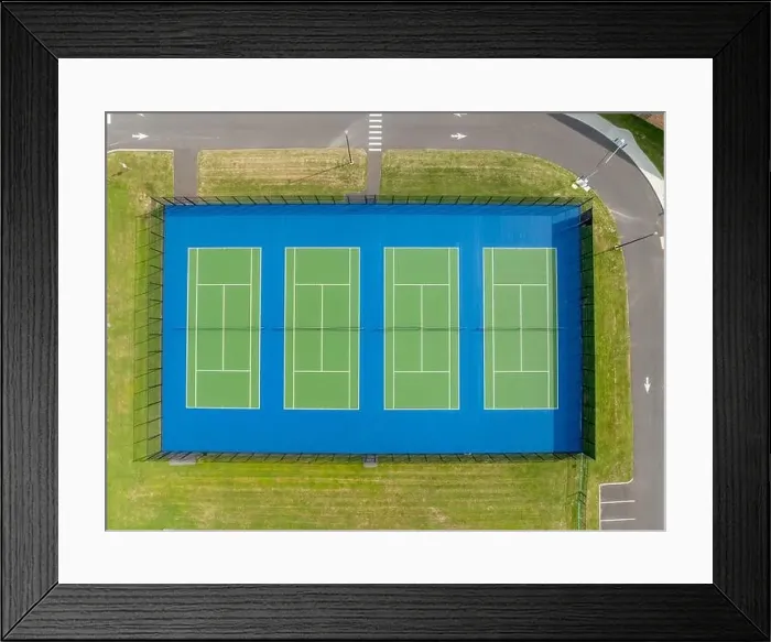 Framed Print : Aerial, drone, photo of new outdoor green tennis courts with white lines and blue out of bounds area Framed Print : Aerial, drone, photo of new outdoor green tennis courts with white lines and blue out of bounds area