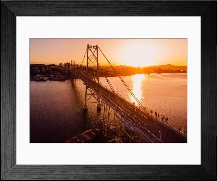 Framed Print : Hercilio luz old cable bridge with golden sunset sky in Florianopolis. Drone view