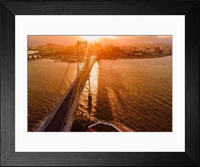 Framed Print : Old cable bridge with sunset light in Florianopolis. Drone view Framed Print : Old cable bridge with sunset light in Florianopolis. Drone view