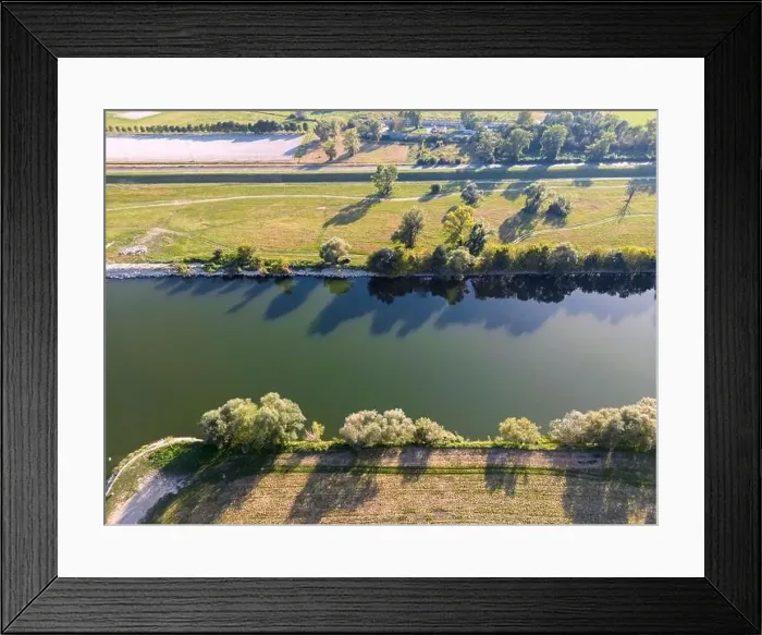 Framed Print : Top down aerial view of Sava river embankment, popular for sport fishing on the eastern side of Zagreb city, Croatia Framed Print : Top down aerial view of Sava river embankment, popular for sport fishing on the eastern side of Zagreb city, Croatia