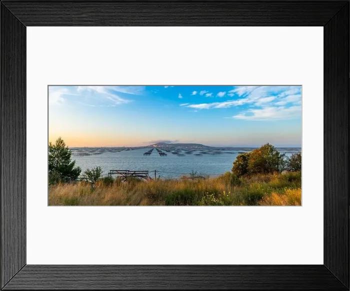 Framed Print : Mont Saint Clair and the Etang de Thau at sunrise, with its oyster tables in Hérault, Occitanie, France Framed Print : Mont Saint Clair and the Etang de Thau at sunrise, with its oyster tables in Hérault, Occitanie, France