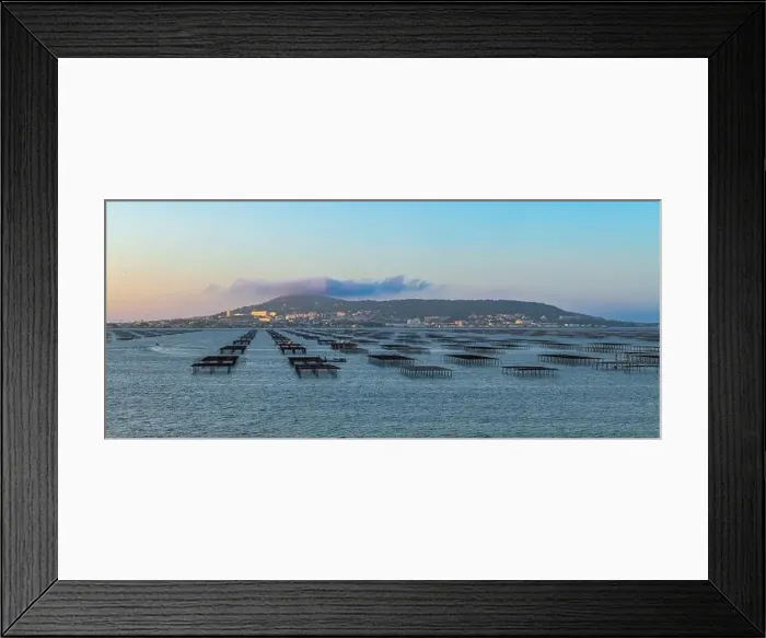Framed Print : Mont Saint Clair and the Etang de Thau at sunrise, with its oyster tables in Hérault, Occitanie, France Framed Print : Mont Saint Clair and the Etang de Thau at sunrise, with its oyster tables in Hérault, Occitanie, France