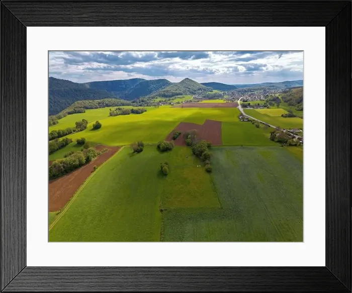 Framed Print : Landscape with fields, mountains and river in France near Besancon in spring, Franche-Comte Framed Print : Landscape with fields, mountains and river in France near Besancon in spring, Franche-Comte