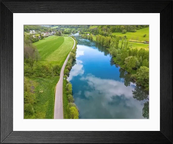 Framed Print : Landscape with fields, mountains and river in France near Besancon in spring, Franche-Comte Framed Print : Landscape with fields, mountains and river in France near Besancon in spring, Franche-Comte