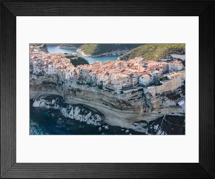 Framed Print : Aerial drone Bonifacio Corsica France cliff side historic town Framed Print : Aerial drone Bonifacio Corsica France cliff side historic town