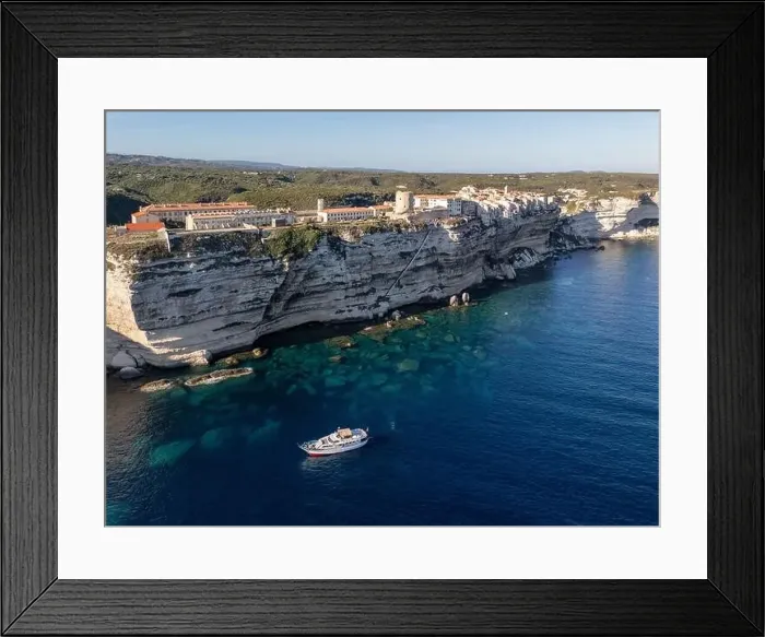 Framed Print : Aerial drone Bonifacio Corsica France cliff side historic town Framed Print : Aerial drone Bonifacio Corsica France cliff side historic town