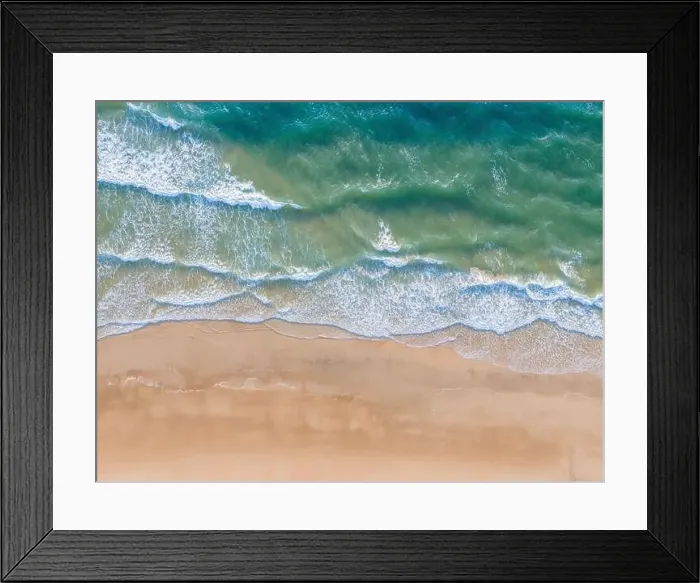 Framed Print : Ocean waves on the beach as a background