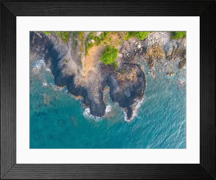 Framed Print : View of Ganh Da Dia or Da Dia Reef is a seashore area of uniformly interlocking basalt rock columns located along Framed Print : View of Ganh Da Dia or Da Dia Reef is a seashore area of uniformly interlocking basalt rock columns located along