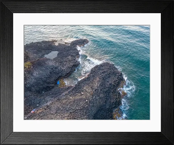 Framed Print : View of Ganh Da Dia or Da Dia Reef is a seashore area of uniformly interlocking basalt rock columns located along