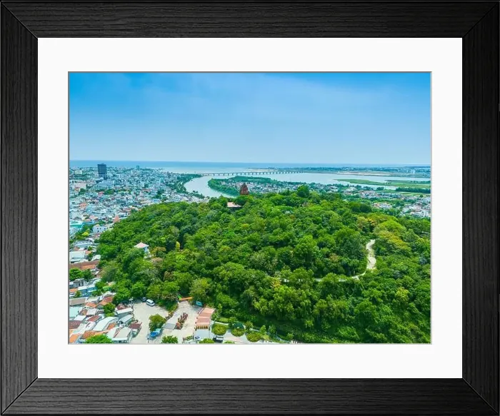 Framed Print : Aerial view of Nhan temple, tower is an artistic architectural work of Champa people in Tuy Hoa city Framed Print : Aerial view of Nhan temple, tower is an artistic architectural work of Champa people in Tuy Hoa city