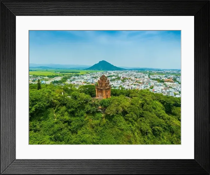 Framed Print : Aerial view of Nhan temple, tower is an artistic architectural work of Champa people in Tuy Hoa city Framed Print : Aerial view of Nhan temple, tower is an artistic architectural work of Champa people in Tuy Hoa city