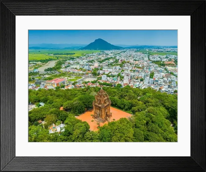 Framed Print : Aerial view of Nhan temple, tower is an artistic architectural work of Champa people in Tuy Hoa city Framed Print : Aerial view of Nhan temple, tower is an artistic architectural work of Champa people in Tuy Hoa city