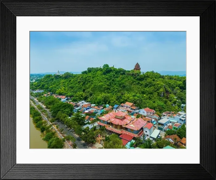 Framed Print : Aerial view of Nhan temple, tower is an artistic architectural work of Champa people in Tuy Hoa city Framed Print : Aerial view of Nhan temple, tower is an artistic architectural work of Champa people in Tuy Hoa city