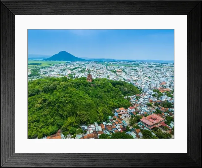 Framed Print : Aerial view of Nhan temple, tower is an artistic architectural work of Champa people in Tuy Hoa city Framed Print : Aerial view of Nhan temple, tower is an artistic architectural work of Champa people in Tuy Hoa city