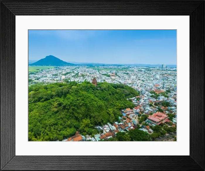 Framed Print : Aerial view of Nhan temple, tower is an artistic architectural work of Champa people in Tuy Hoa city Framed Print : Aerial view of Nhan temple, tower is an artistic architectural work of Champa people in Tuy Hoa city