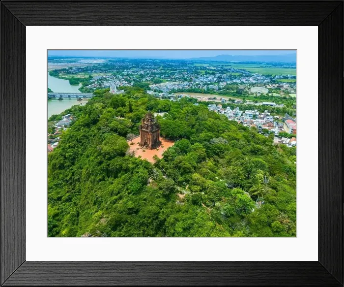 Framed Print : Aerial view of Nhan temple, tower is an artistic architectural work of Champa people in Tuy Hoa city Framed Print : Aerial view of Nhan temple, tower is an artistic architectural work of Champa people in Tuy Hoa city