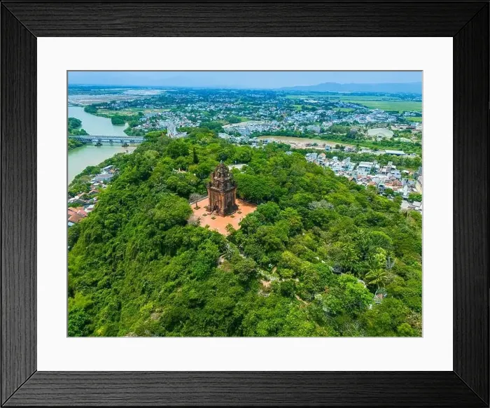 Framed Print : Aerial view of Nhan temple, tower is an artistic architectural work of Champa people in Tuy Hoa city Framed Print : Aerial view of Nhan temple, tower is an artistic architectural work of Champa people in Tuy Hoa city